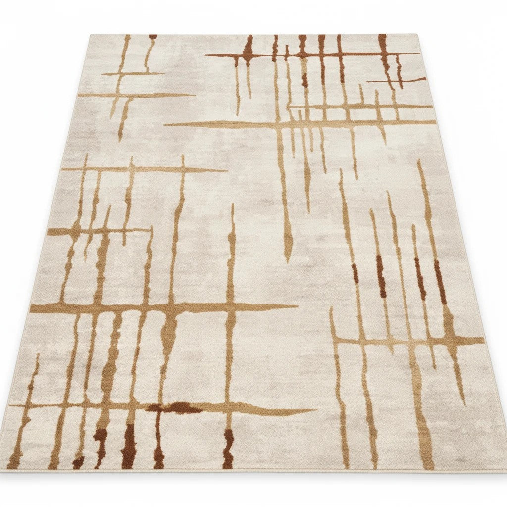 INOUTHOMECO modern area rug with abstract gold and terracotta grid lines on a soft cream and ivory synthetic surface.