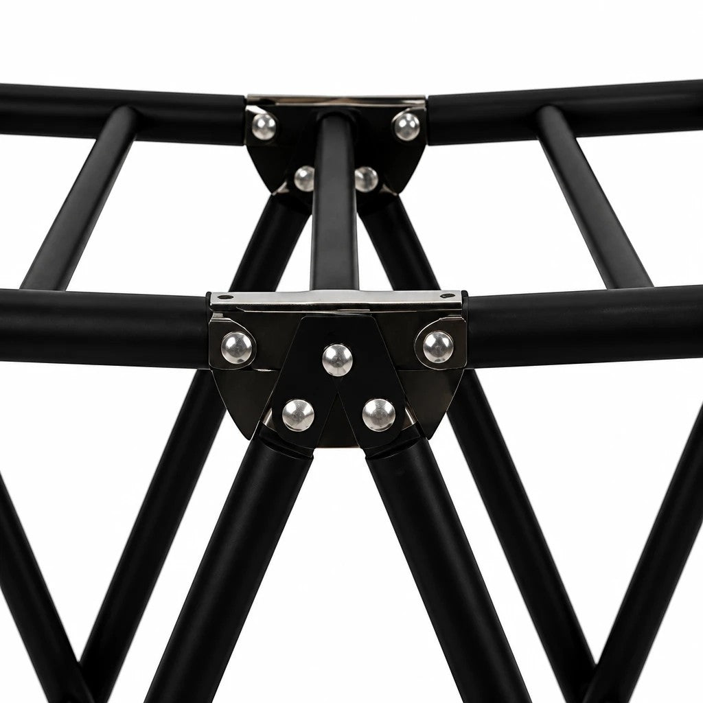 Close-up of the INOUTHOMECO 2-tier black steel clothes drying rack showing the sturdy metal joints and frame structure.