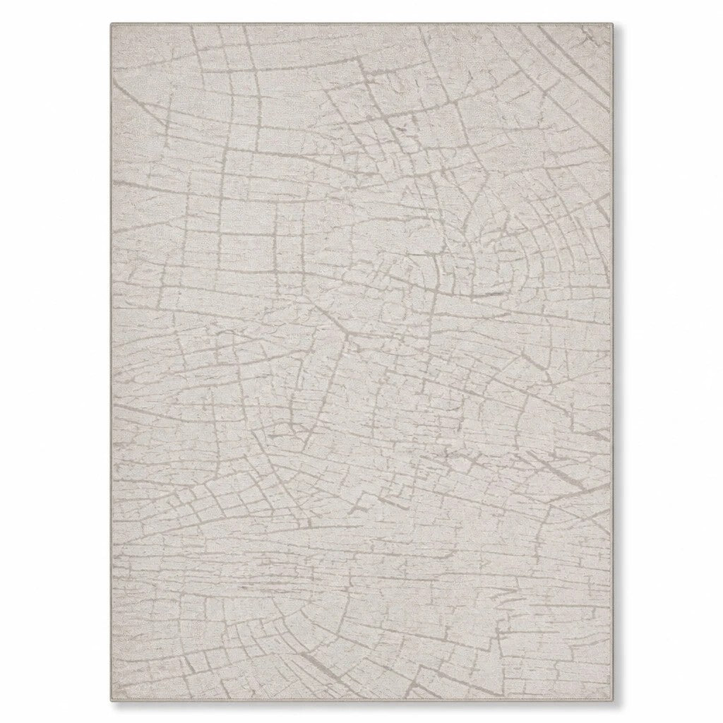 INOUTHOMECO minimalist area rug with a cream and grey abstract crackle pattern in durable synthetic fibers.