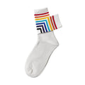 INOUTHOMECO white crew socks featuring a vibrant rainbow striped cuff for a playful and comfortable everyday style.